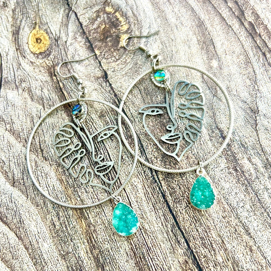 silver monstera plant earrings