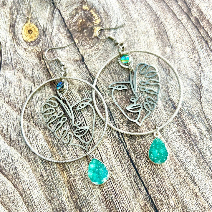 silver monstera plant earrings