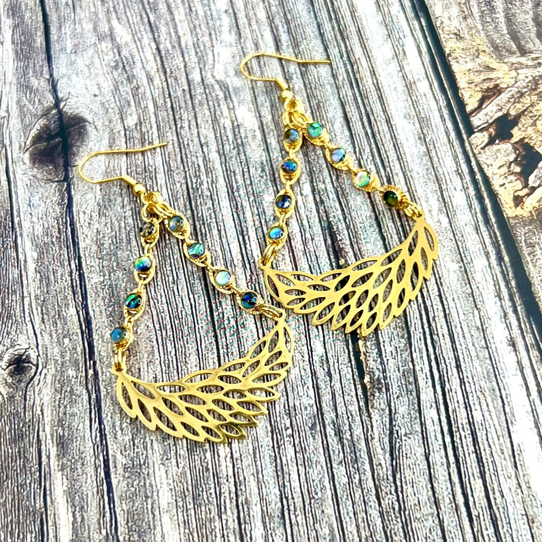 gold feather earrings