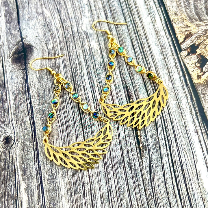 gold feather earrings
