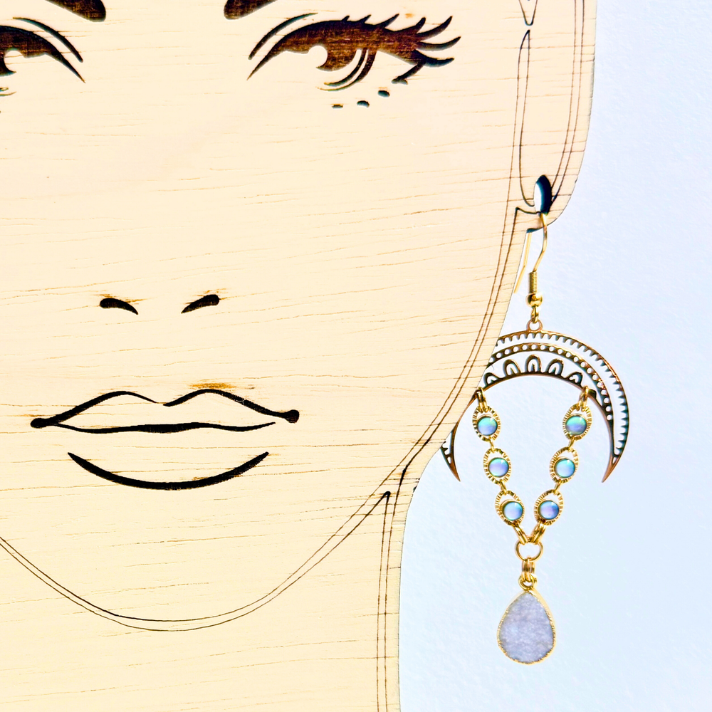 Earrings with mother of pearl stones and gold crescent moon accents